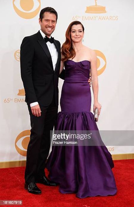 Alexis with his wife ALyson HAnnigan which is also an actor